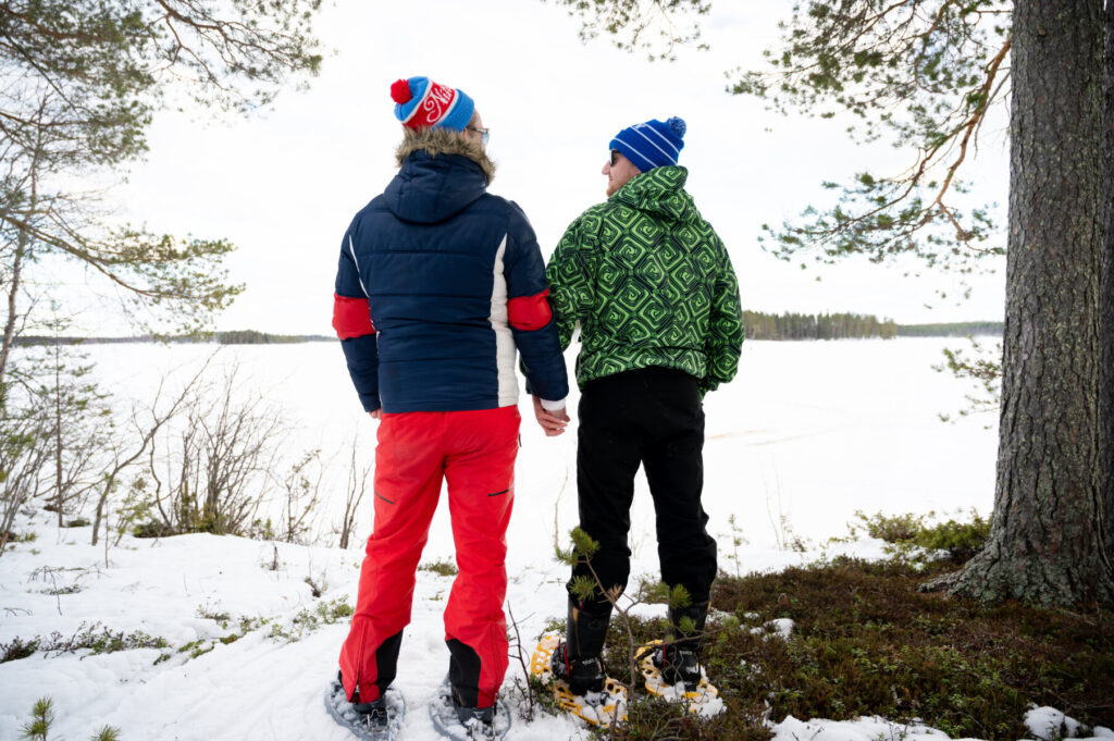 Gay couple on snowshoes
